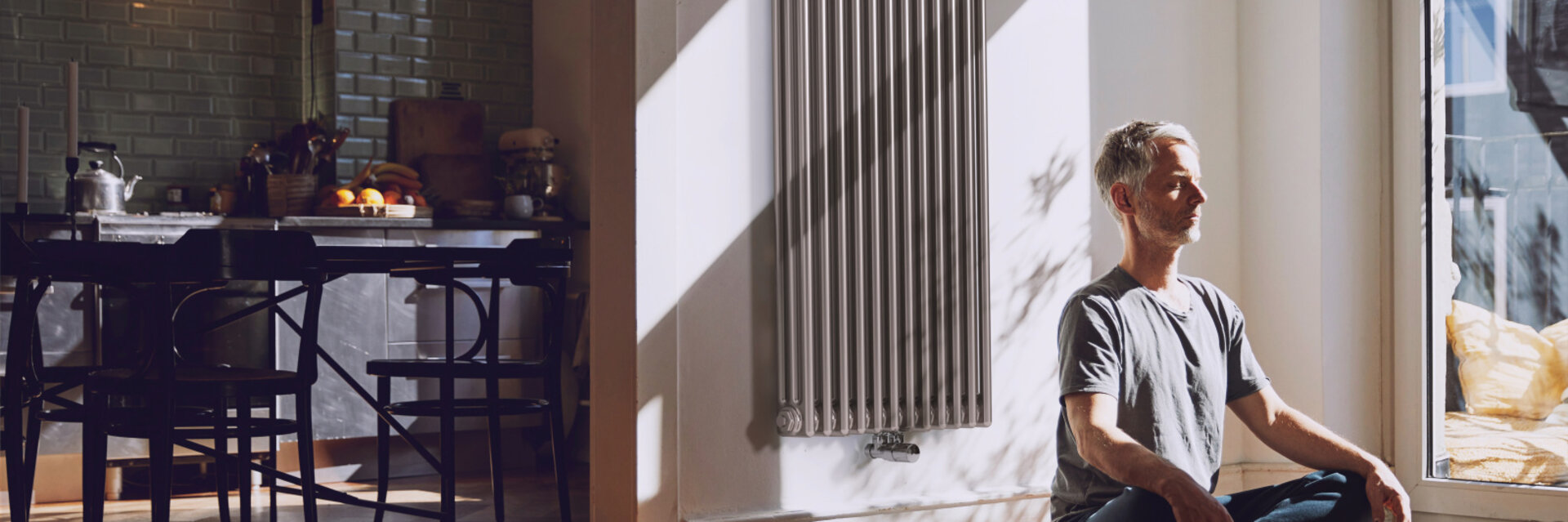 man meditates, old building flat, relaxed, charleston