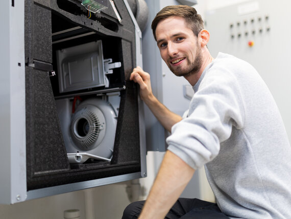 young man working for Students 