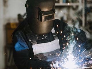 Welding Zehnder Employee person wleding zehnder products