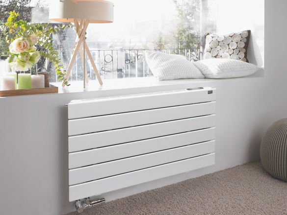 living room wall with a design radiator zehnder nova neo