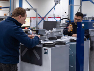 Recycled products from Zehnder two men working on zehnder reycled products