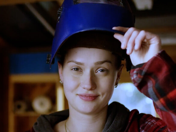 women wearing  a production helmet