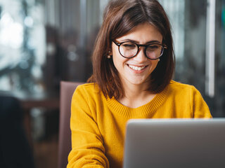 Code of Conduct E-Learning women siiting infront of PC  training elearning code of conduct