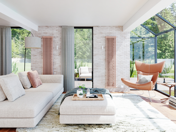 modernes wohnzimmer mit einem zehnder charleston heizkörper